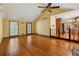 Bright living room showcasing hardwood floors, vaulted ceilings, and seamless flow into the adjacent kitchen at 626 Cheatham Sw Dr, Marietta, GA 30064