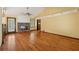Bright living room featuring a stone fireplace, hardwood floors, and a ceiling fan at 626 Cheatham Sw Dr, Marietta, GA 30064