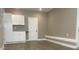 Bedroom featuring modern flooring, neutral color palette, and a large closet at 710 Wind Song Trce, Woodstock, GA 30189