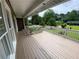 Front porch view with white railing, offering a welcoming entrance and outdoor relaxation space at 710 Wind Song Trce, Woodstock, GA 30189