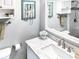Bathroom includes a white countertop, undermount sink, and modern faucet with a flower accent at 800 Peachtree Ne St # 1319, Atlanta, GA 30308