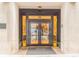 Elegant building entrance with glass doors and 'Landmark' mat at 800 Peachtree Ne St # 1319, Atlanta, GA 30308