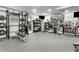 Spacious gym featuring weight racks, free weights, and mirrored walls at 800 Peachtree Ne St # 1319, Atlanta, GA 30308