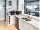 Kitchen features light granite countertops, an undermount sink, and stainless steel appliances at 800 Peachtree Ne St # 1319, Atlanta, GA 30308