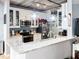 Kitchen includes granite countertops, stainless steel appliances, pendant lighting, and exposed ceiling pipes at 800 Peachtree Ne St # 1319, Atlanta, GA 30308