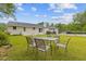 Backyard with outdoor seating and view of the pool at 256 Teresa Ln, Loganville, GA 30052