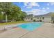Beautiful backyard with a spacious pool, diving board, and plenty of space for outdoor entertaining at 256 Teresa Ln, Loganville, GA 30052
