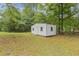 Backyard featuring a shed that could be used as a workshop, storage, or hobby space at 256 Teresa Ln, Loganville, GA 30052