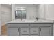 Bathroom with double sinks and a glass shower at 8 Foothills Trl, Sharpsburg, GA 30277