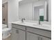 Bathroom with double vanity and large mirror at 8 Foothills Trl, Sharpsburg, GA 30277