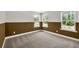 Bedroom with large windows allowing for plenty of natural light to come in at 8 Foothills Trl, Sharpsburg, GA 30277