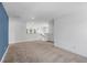 Large bonus room with neutral carpeting and great natural light at 8 Foothills Trl, Sharpsburg, GA 30277