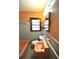 Retro bathroom featuring pink fixtures, gray tile, and a window for natural light at 1305 Lenox Cir, Atlanta, GA 30306