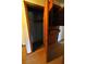 Bedroom closet with built in shelving and drawers with vintage wood finishes at 1305 Lenox Cir, Atlanta, GA 30306