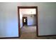 Open doorway with view into a bright living room with chandelier at 1305 Lenox Cir, Atlanta, GA 30306