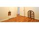 Bedroom featuring hardwood floors with doorway and closet doors at 1332 Euclid Ave # C, Atlanta, GA 30307
