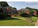 Exterior view of brick apartment buildings with well maintained grass and landscaping at 1332 Euclid Ave # C, Atlanta, GA 30307