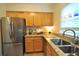 Bright kitchen featuring stainless steel appliances, double sink and granite countertops at 1332 Euclid Ave # C, Atlanta, GA 30307