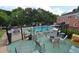 Community pool area with fenced in perimeter, tables, chairs and grill for resident use at 1332 Euclid Ave # C, Atlanta, GA 30307