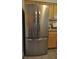 Close-up of a stainless steel refrigerator with double doors and a bottom freezer drawer at 1332 Euclid Ave # C, Atlanta, GA 30307