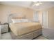 Bright main bedroom featuring soft natural light, neutral colors, and a tray ceiling at 1644 Beaver Creek Ln, Snellville, GA 30078
