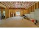 Unfinished basement featuring exposed ceilings and walls with a kayak at 270 Alcovy Reserve Way, Covington, GA 30014
