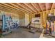 Unfinished basement featuring workout equipment and exposed ceilings at 270 Alcovy Reserve Way, Covington, GA 30014