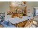 Dining area with table and chairs with view of kitchen, living room and outdoor access at 270 Alcovy Reserve Way, Covington, GA 30014