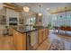 Spacious kitchen island with seating and sink, open to the living and dining areas at 270 Alcovy Reserve Way, Covington, GA 30014