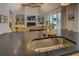 Close-up of kitchen sink in island, with living room and fireplace in the background at 270 Alcovy Reserve Way, Covington, GA 30014