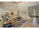 Open living area connects the kitchen, stairs, entryway, and backyard access at 270 Alcovy Reserve Way, Covington, GA 30014