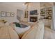 Spacious living room with a fireplace, custom built-ins, and comfortable seating at 270 Alcovy Reserve Way, Covington, GA 30014