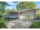 Spacious backyard with a concrete patio and a wooden deck and screened-in porch at 3337 Toney Dr, Decatur, GA 30032