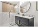 Beautiful bathroom features a glass shower, large mirror, and modern vanity at 3337 Toney Dr, Decatur, GA 30032