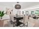 Elegant dining area with stylish lighting, comfortable seating, and modern design at 3337 Toney Dr, Decatur, GA 30032