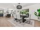 Open floorplan featuring an eat-in kitchen and dining area with a sliding glass door to a screened patio at 3337 Toney Dr, Decatur, GA 30032