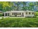 Desirable renovated ranch features new paint, manicured lawn, & mature shade trees at 3337 Toney Dr, Decatur, GA 30032