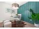 Stylish home office with an accent wall and unique transparent desk at 3337 Toney Dr, Decatur, GA 30032