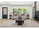 Inviting living room featuring stylish furnishings, neutral colors, and plenty of natural light at 3337 Toney Dr, Decatur, GA 30032