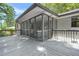 Exterior view of screened porch and deck, showcasing the home's outdoor living space at 3337 Toney Dr, Decatur, GA 30032