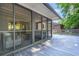 Comfortable screened porch with sliding doors and outdoor seating on the back of the home at 3337 Toney Dr, Decatur, GA 30032