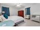 Bright bedroom boasts light grey walls, white trim, and plush white bedding at 461 Village Green Sw Ct, Lilburn, GA 30047