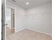 Unfurnished walk-in closet with standard wire shelving for storage and neutral carpeting at 7205 Brushwood Bend (Lot 31), Lithonia, GA 30058