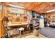 Organized basement workshop with pegboard, workbench, tools, and ample storage solutions for hobbies or projects at 781 Templeton Dr, Loganville, GA 30052
