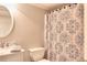 Bathroom featuring vanity, toilet and patterned shower curtain at 781 Templeton Dr, Loganville, GA 30052