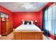 Bright bedroom featuring a comfortable bed, and a window with natural light at 781 Templeton Dr, Loganville, GA 30052