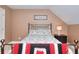 Inviting bedroom featuring comfortable bed, neutral color scheme, and natural light at 781 Templeton Dr, Loganville, GA 30052