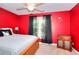 Bedroom with white bedspread and black curtains at 781 Templeton Dr, Loganville, GA 30052