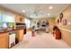 Versatile bonus room with bright lighting, windows, a desk, and unique decor for a home office or hobby space at 781 Templeton Dr, Loganville, GA 30052