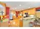 Well-lit kitchen featuring stainless steel appliances and wooden cabinetry at 781 Templeton Dr, Loganville, GA 30052